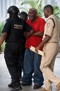 Murder Suspect, Sam Jackson, Behind Bars