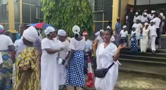 A TEAM OF PRAYER WARRIORS ACCOMPANIES FINDA BUNDOO TO COURT